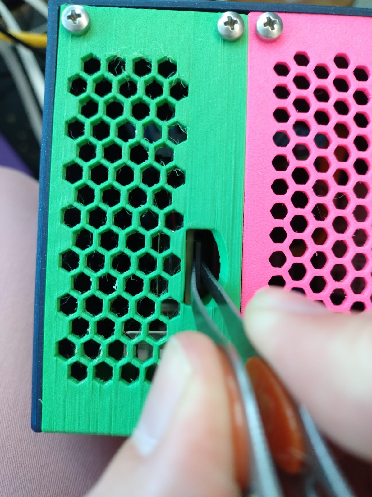 Using tweezers to pull out the SD card is easy, thanks to the hole that bo0tzz designed into the case.